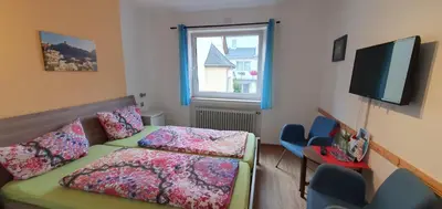 Ein Bett oder Betten in einem Zimmer der Unterkunft Pension Regina
