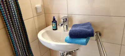 Ein Badezimmer in der Unterkunft Pension Regina
