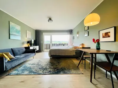 Ein Sitzbereich in der Unterkunft #2 Studioapartment mit Loreleyblick direkt an der schönsten Etappe des Rheinsteigs