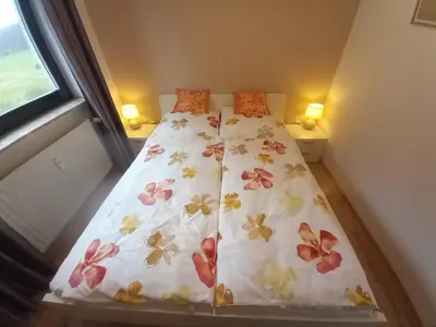 Ein Bett oder Betten in einem Zimmer der Unterkunft Ferienwohnung Sophia
