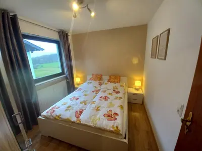 Ein Bett oder Betten in einem Zimmer der Unterkunft Ferienwohnung Sophia