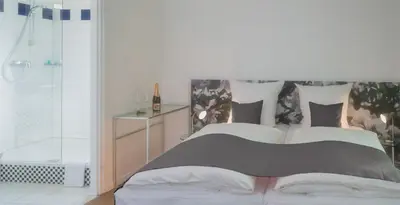 Ein Bett oder Betten in einem Zimmer der Unterkunft Eurostrand Resort Moseltal