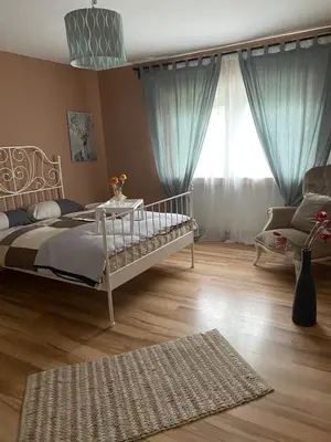 Ein Bett oder Betten in einem Zimmer der Unterkunft Sinan's Bio Tourismus Farm Appartement
