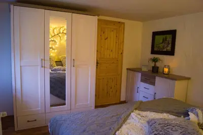 Ein Bett oder Betten in einem Zimmer der Unterkunft Ferienwohnung Zum Jehöschnis