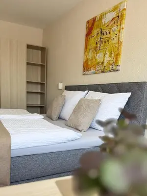 Ein Bett oder Betten in einem Zimmer der Unterkunft Gasthaus Wollscheid
