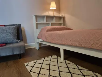 Ein Bett oder Betten in einem Zimmer der Unterkunft Only for Women on Tour