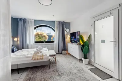 Ein Bett oder Betten in einem Zimmer der Unterkunft Gemütliches & Modernes Apartment