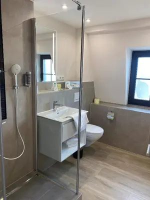 Ein Badezimmer in der Unterkunft Hotel Bären