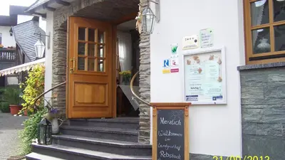 Eine Fassade oder ein Eingang zu Landgasthof Rebstock