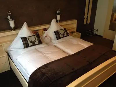 Ein Bett oder Betten in einem Zimmer der Unterkunft Mosel-Pension Gästehaus Christiane, Brodenbach