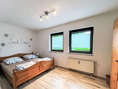 Ein Bett oder Betten in einem Zimmer der Unterkunft Apartment Ferienapartments Adenau-1 by Interhome