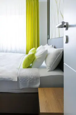 Ein Bett oder Betten in einem Zimmer der Unterkunft Ferienwohnung Burgblick