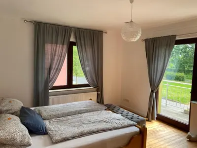 Ein Bett oder Betten in einem Zimmer der Unterkunft Ferienwohnung Familie Kirsten