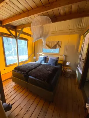 Ein Bett oder Betten in einem Zimmer der Unterkunft Safritop Sabine Emanuel