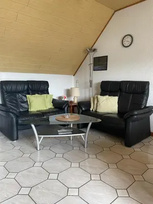 Ein Sitzbereich in der Unterkunft Ferienwohnung Weingut Sanders & Sanders