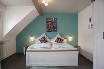 Ein Bett oder Betten in einem Zimmer der Unterkunft Ferienwohnung zur Trübenbach