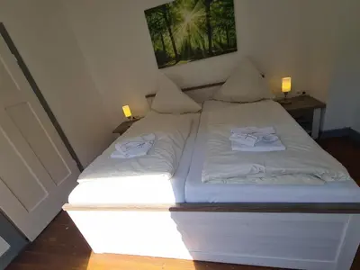 Ein Bett oder Betten in einem Zimmer der Unterkunft Ferienhaus Mühlental 52