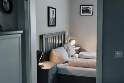 Ein Bett oder Betten in einem Zimmer der Unterkunft Villa Moselstrand