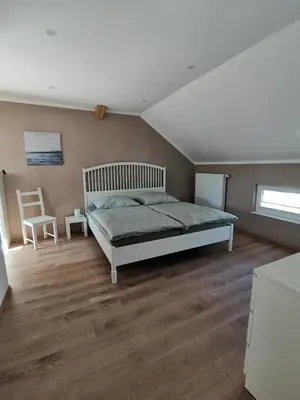 Ein Bett oder Betten in einem Zimmer der Unterkunft Ferienwohnung Dörrebach im Soonwald bei Bingen