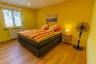 Ein Bett oder Betten in einem Zimmer der Unterkunft Ferienwohnung Philipp