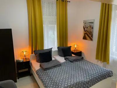 Ein Bett oder Betten in einem Zimmer der Unterkunft Schönes Apartment am Rhein - Zentral