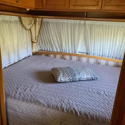 Ein Bett oder Betten in einem Zimmer der Unterkunft Guesthouse Wallenborn - Caravan Chalet