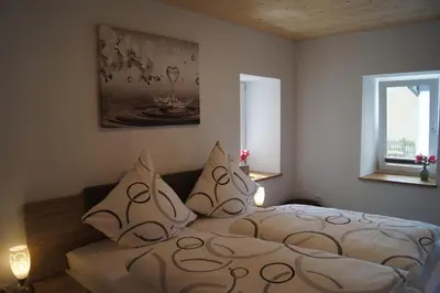 Ein Bett oder Betten in einem Zimmer der Unterkunft Wein- & Ferienhaus Jörg Weirich
