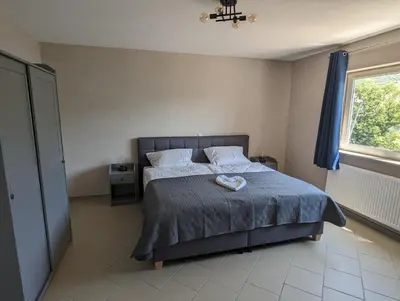 Ein Bett oder Betten in einem Zimmer der Unterkunft Ferienwohnung Rheinperle