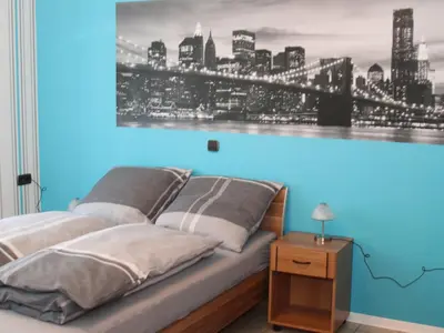 Ein Bett oder Betten in einem Zimmer der Unterkunft Ferienwohnung Marquis