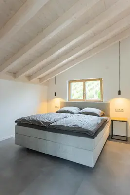 Ein Bett oder Betten in einem Zimmer der Unterkunft Ferienhaus MOSELLODGE