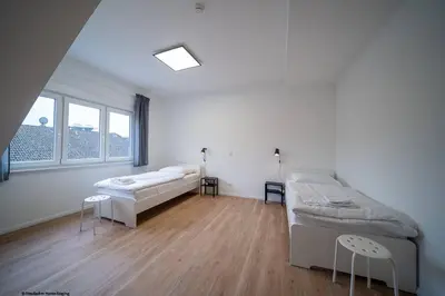 Ein Bett oder Betten in einem Zimmer der Unterkunft DQ03 - Geräumige Monteurwohnung Koblenz