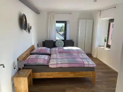 Ein Bett oder Betten in einem Zimmer der Unterkunft Haus in Esch