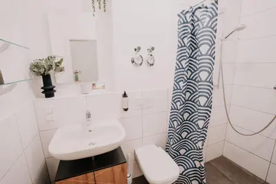 Ein Badezimmer in der Unterkunft Gemütliche Ferienwohnung mit direkter Innenstadtlage