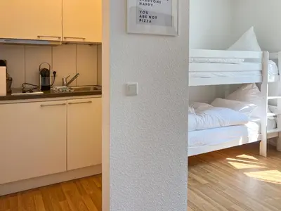 Ein Bett oder Betten in einem Zimmer der Unterkunft Gemütliche Ferienwohnung mit direkter Innenstadtlage