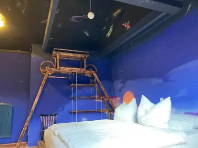 Ein Bett oder Betten in einem Zimmer der Unterkunft Zum süßen Stollen