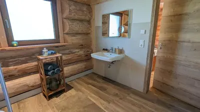 Ein Badezimmer in der Unterkunft Waldzeit Lodge - Ferienwohnung Fuchs