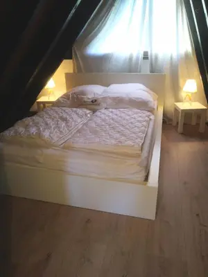 Ein Bett oder Betten in einem Zimmer der Unterkunft Ferienhaus Freilingen 184