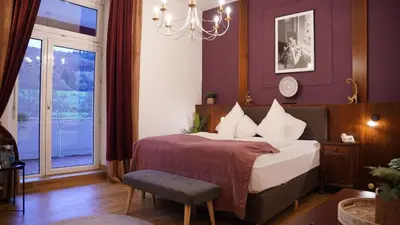 Ein Bett oder Betten in einem Zimmer der Unterkunft Vegan Hotel und Restaurants Nicolay 1881