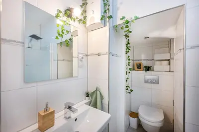 Ein Badezimmer in der Unterkunft Wohlfühlwohnung mit 25 qm Terrasse, Netflix