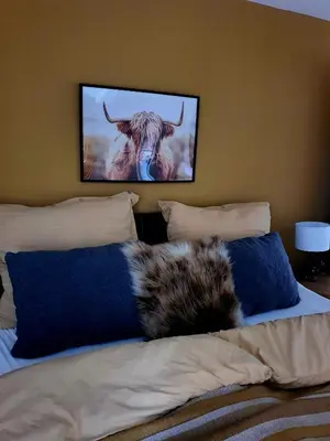 Ein Bett oder Betten in einem Zimmer der Unterkunft House with two aprtments together, up to 9 persons