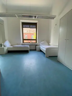 Ein Bett oder Betten in einem Zimmer der Unterkunft Schicke Monteurunterkunft in Mendig mit drei Wohneinheiten
