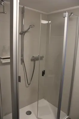 Ein Badezimmer in der Unterkunft Bachmeier's Gasthaus Traube Niederfell