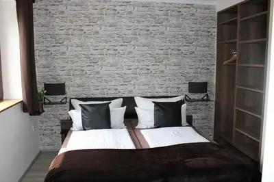 Ein Bett oder Betten in einem Zimmer der Unterkunft Bachmeier's Gasthaus Traube Niederfell