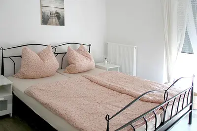 Ein Bett oder Betten in einem Zimmer der Unterkunft Görg Ferienwohnungen