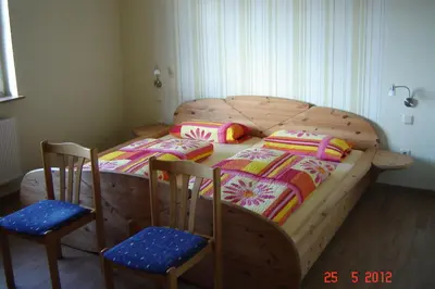 Ein Bett oder Betten in einem Zimmer der Unterkunft Urlaub auf dem Bauernhof Marx