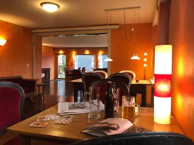 Ein Sitzbereich in der Unterkunft Landhotel Pension Haus Sonneck
