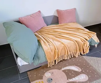 Ein Bett oder Betten in einem Zimmer der Unterkunft Ferienhaus 
