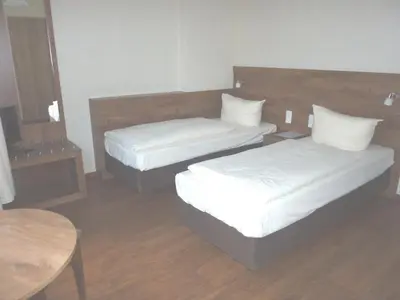 Ein Bett oder Betten in einem Zimmer der Unterkunft Hotel am Markt Sankt Goar