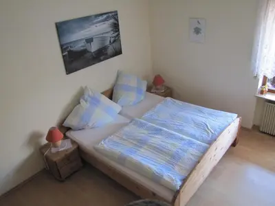 Ein Bett oder Betten in einem Zimmer der Unterkunft B&B Panoramablick