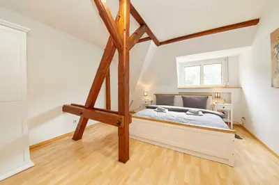 Ein Bett oder Betten in einem Zimmer der Unterkunft Haus am Hafen